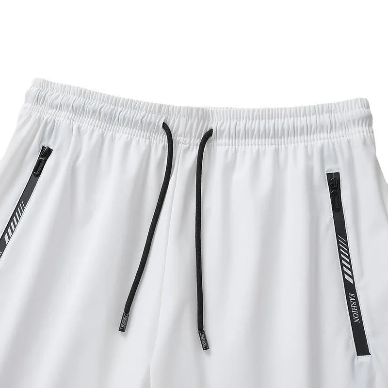Men's black quick-drying nylon sports shorts with loose fit and elastic waistband