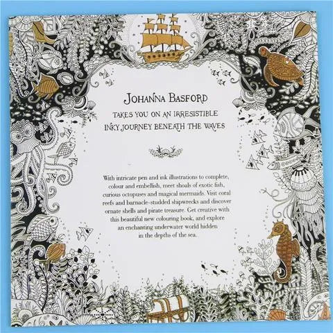Lost Ocean DIY Coloring Book open to a page with detailed coral and fish illustrations, A4 size, single-sided pages.