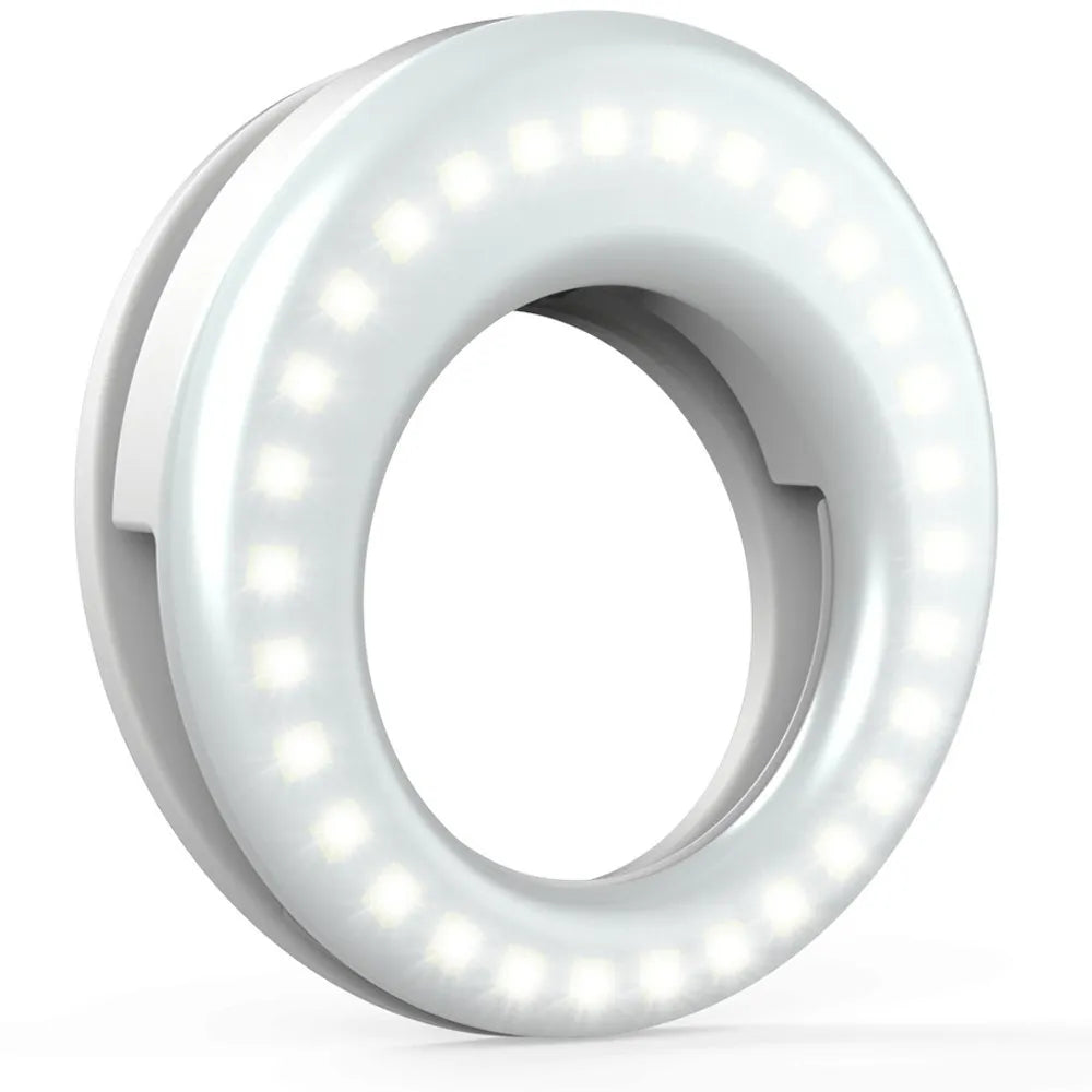 Compact black selfie ring light for mobile phone with USB cable for charging.
