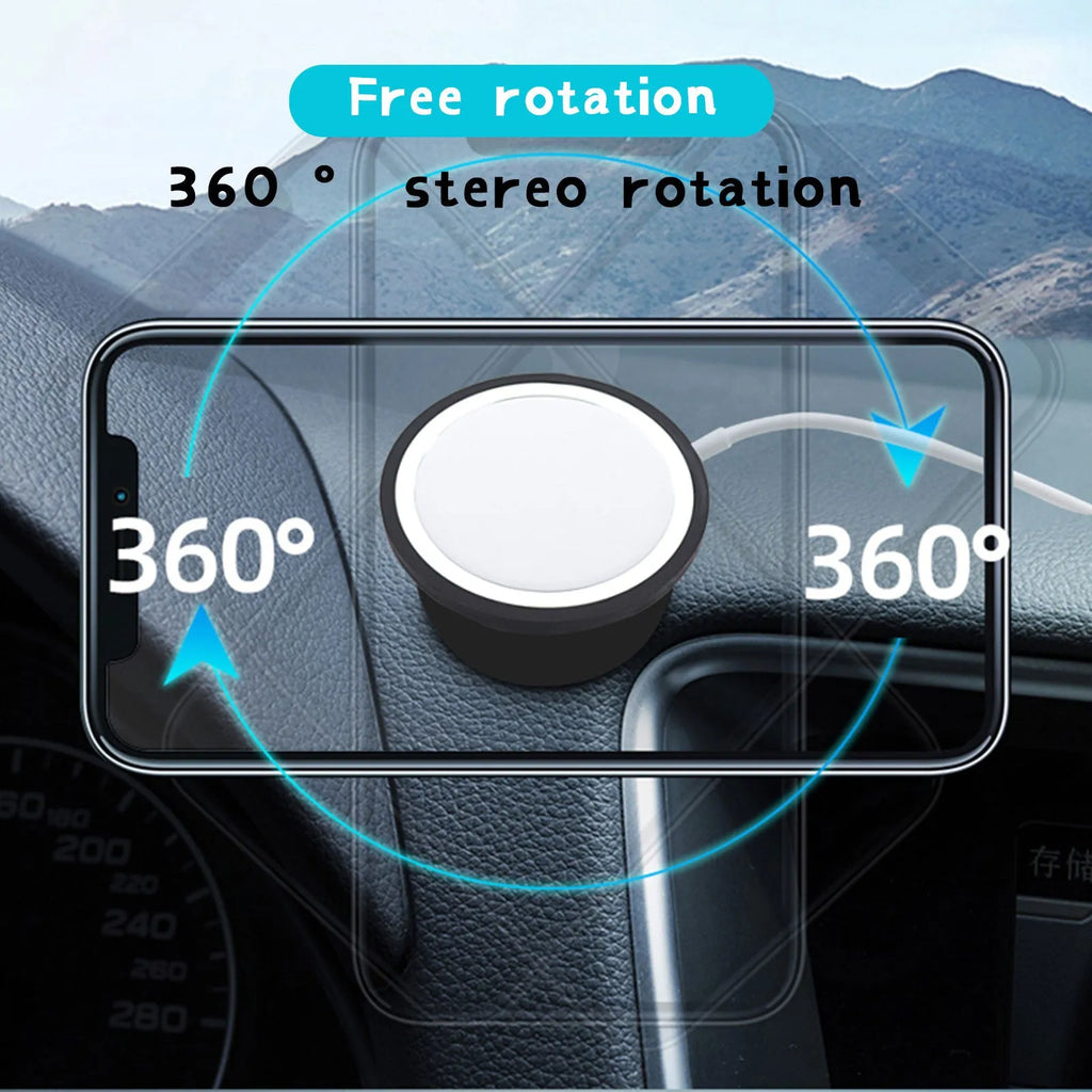 Black car magnetic mobile phone holder mounted on vehicle dashboard