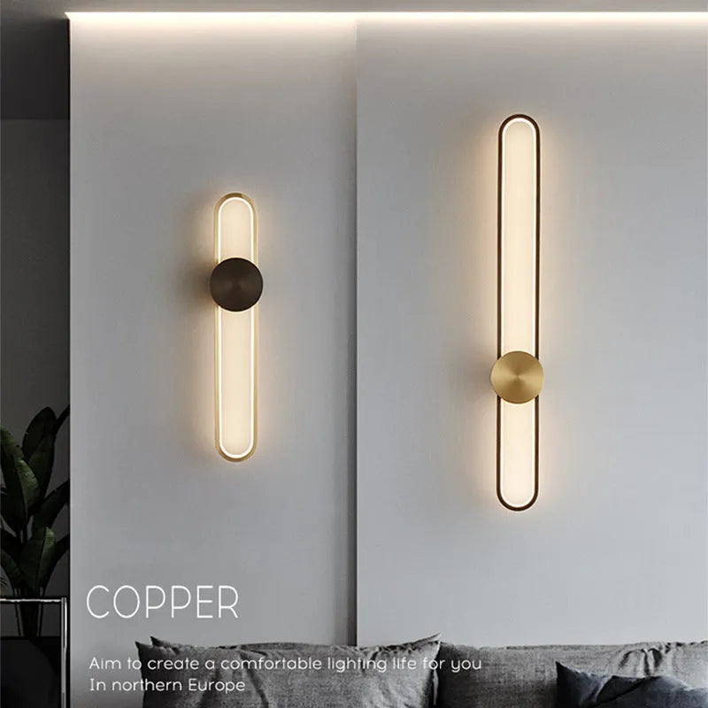 Modern round wall lamp with iron shade in choice of four finishes including black and gold options