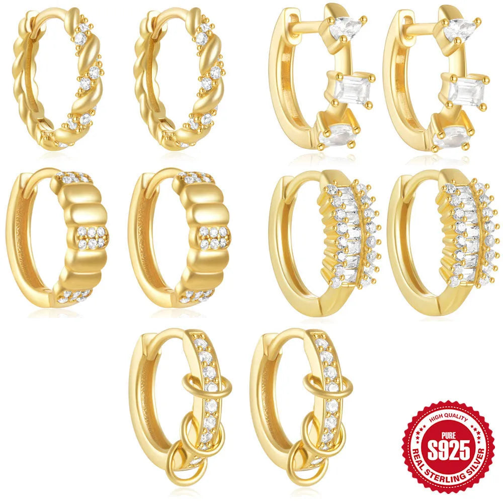 Sterling silver geometric stud earrings with circular diamond-style design in gold and silver electroplated finishes