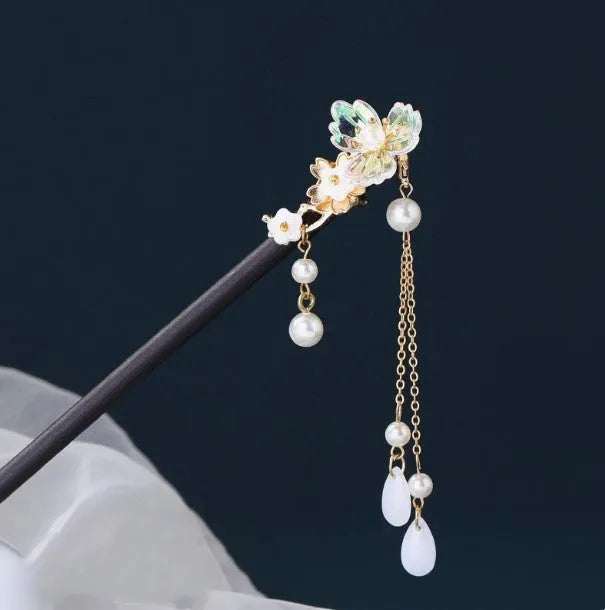 Chinese ancient style floral alloy hairpin with electroplated finish on dark background