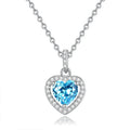 Sterling silver heart pendant necklace with natural coloured gemstone on adjustable cross chain