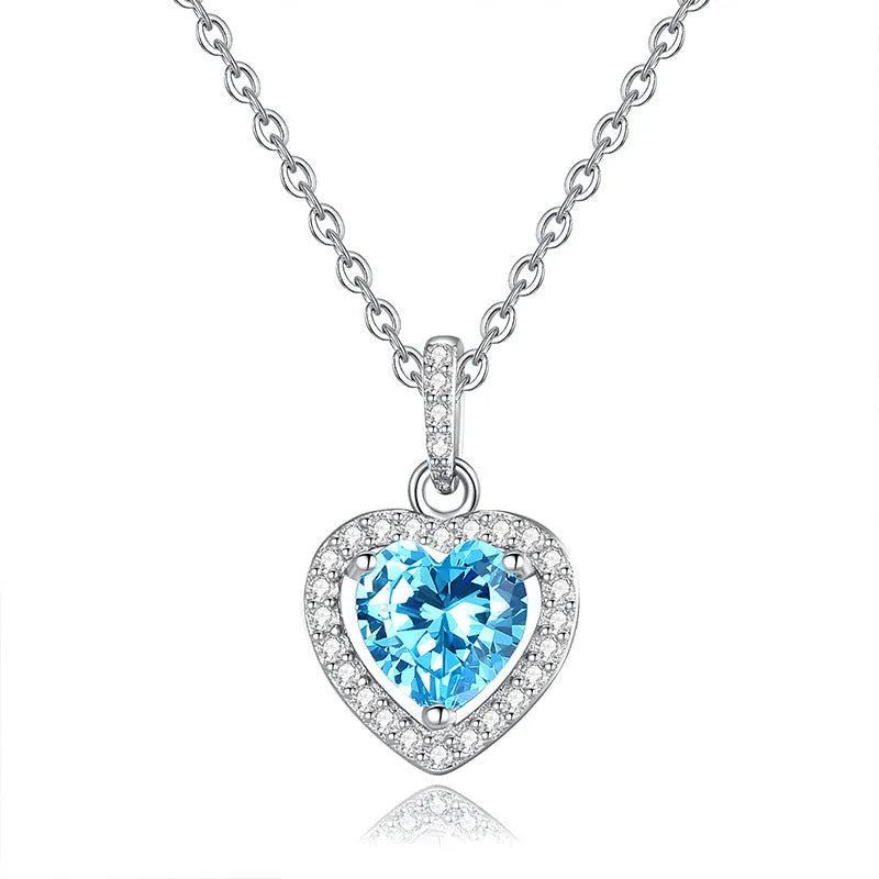 Sterling silver heart pendant necklace with natural coloured gemstone on adjustable cross chain