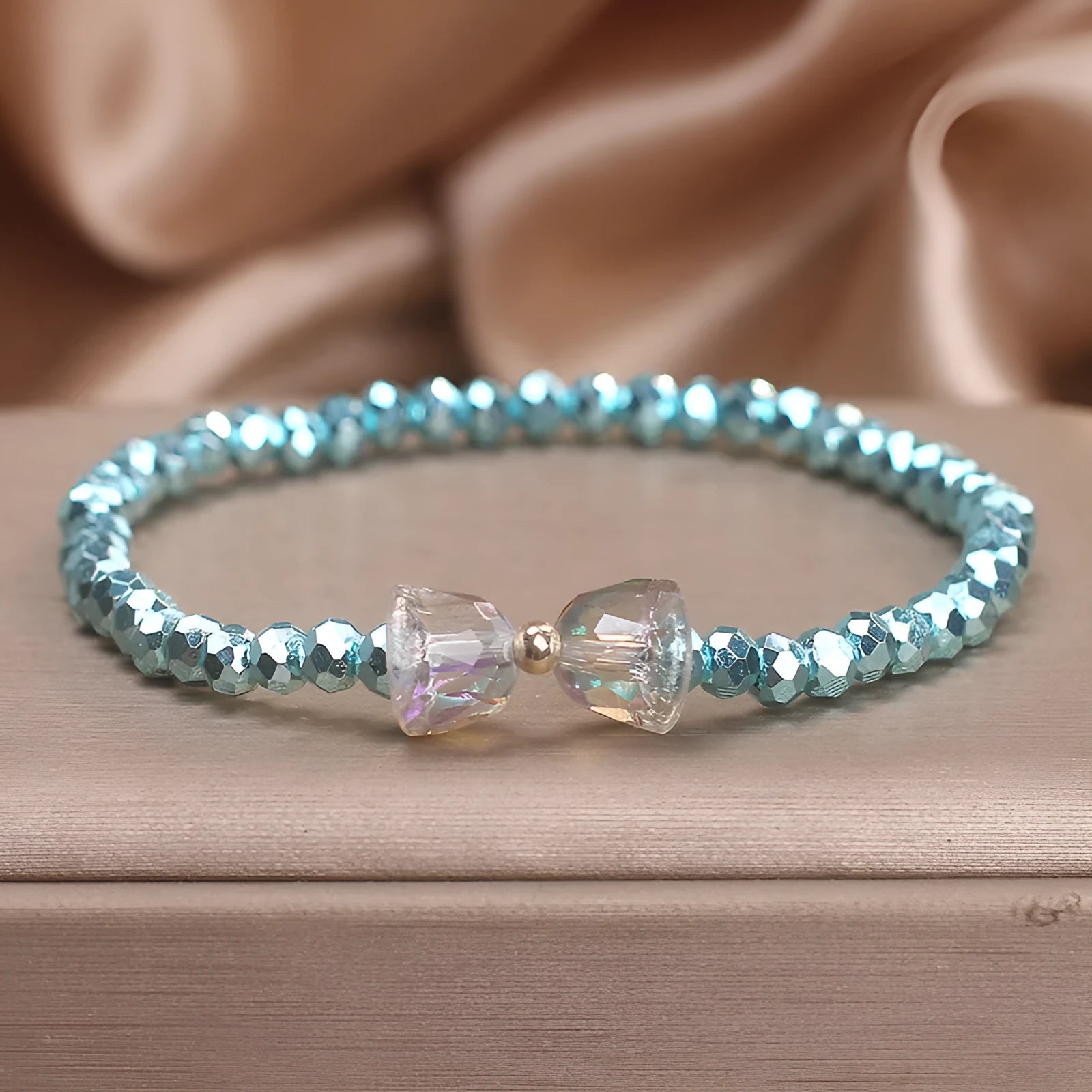 Colourful artificial crystal butterfly bracelet in blue, dark pink, and light pink, handcrafted with ethnic style for women