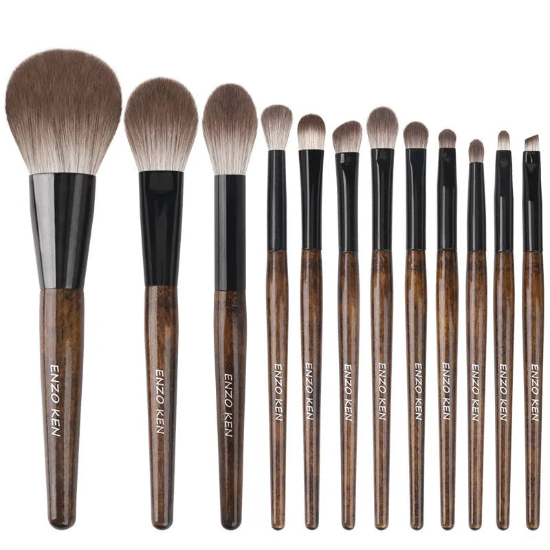 12-piece makeup brush set with wooden handles in black PU roll-up case