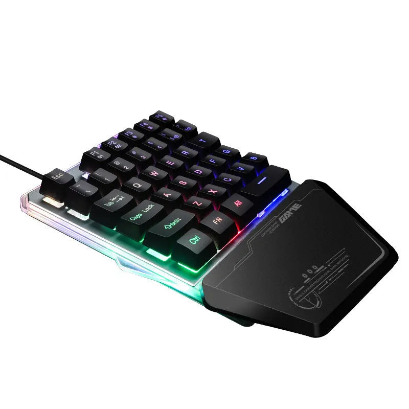 G40 Flow Colour black one-handed robotic keyboard with RGB backlit keys on a desk