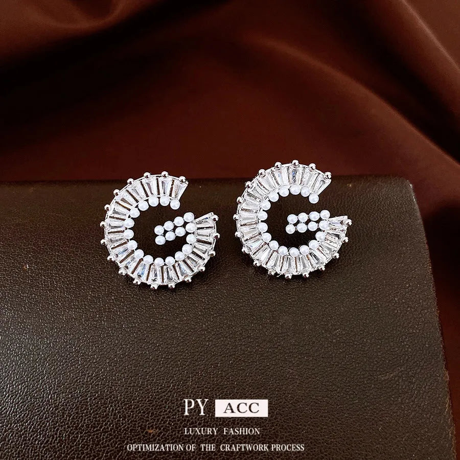 Silver alphabet letter earrings with imitation pearl and inlaid zircon for women light luxury fashion