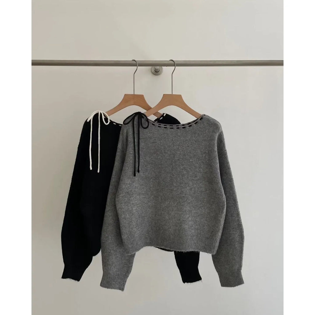 Women's grey loose fit V-neck knitwear pullover jumper on hanger