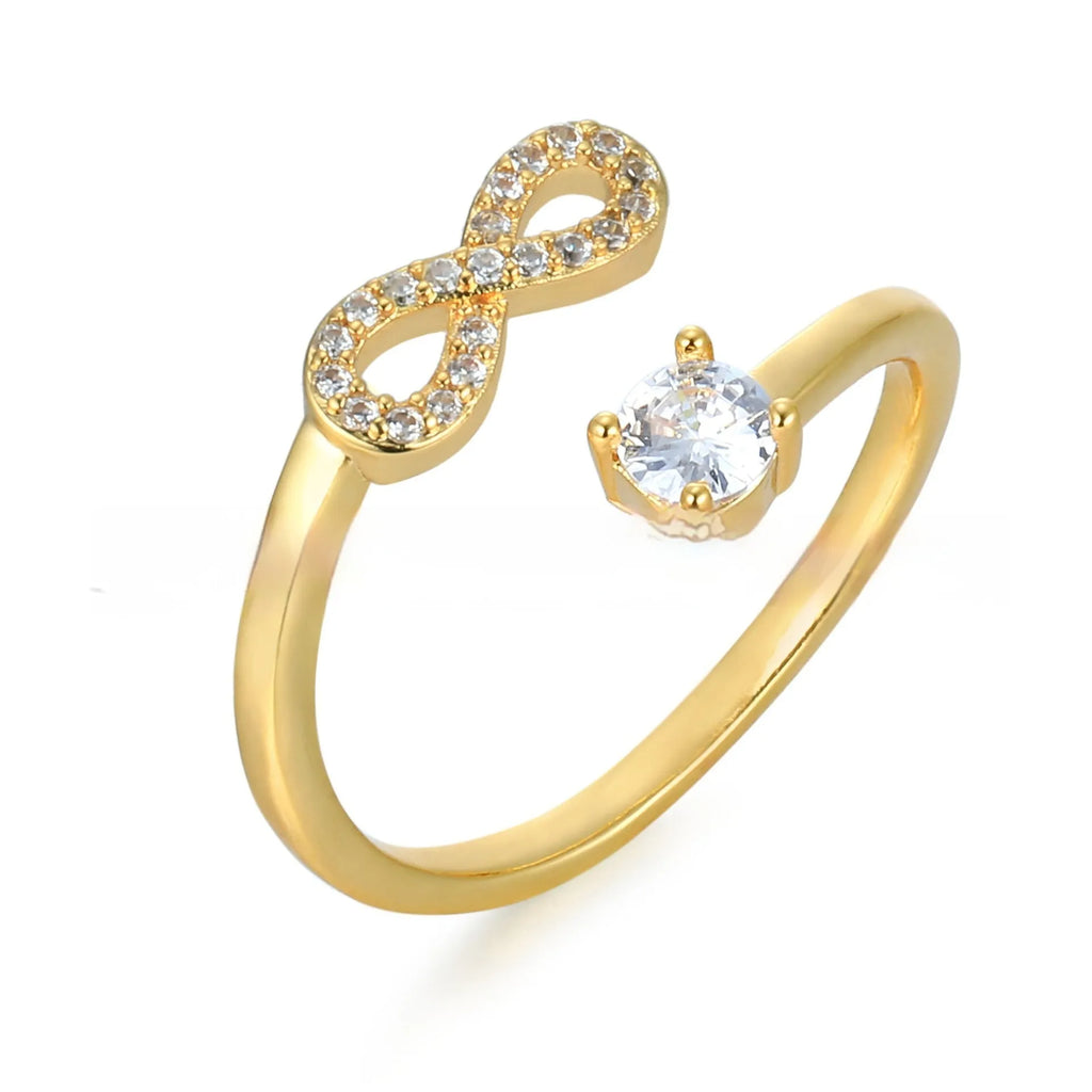 Geometric open design letter ring with inlaid zircon stones in gold, rose gold, or silver metal.