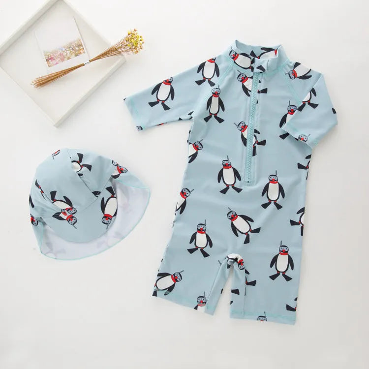 Boys' penguin print polyester swimsuit set with matching swimming cap for sun protection