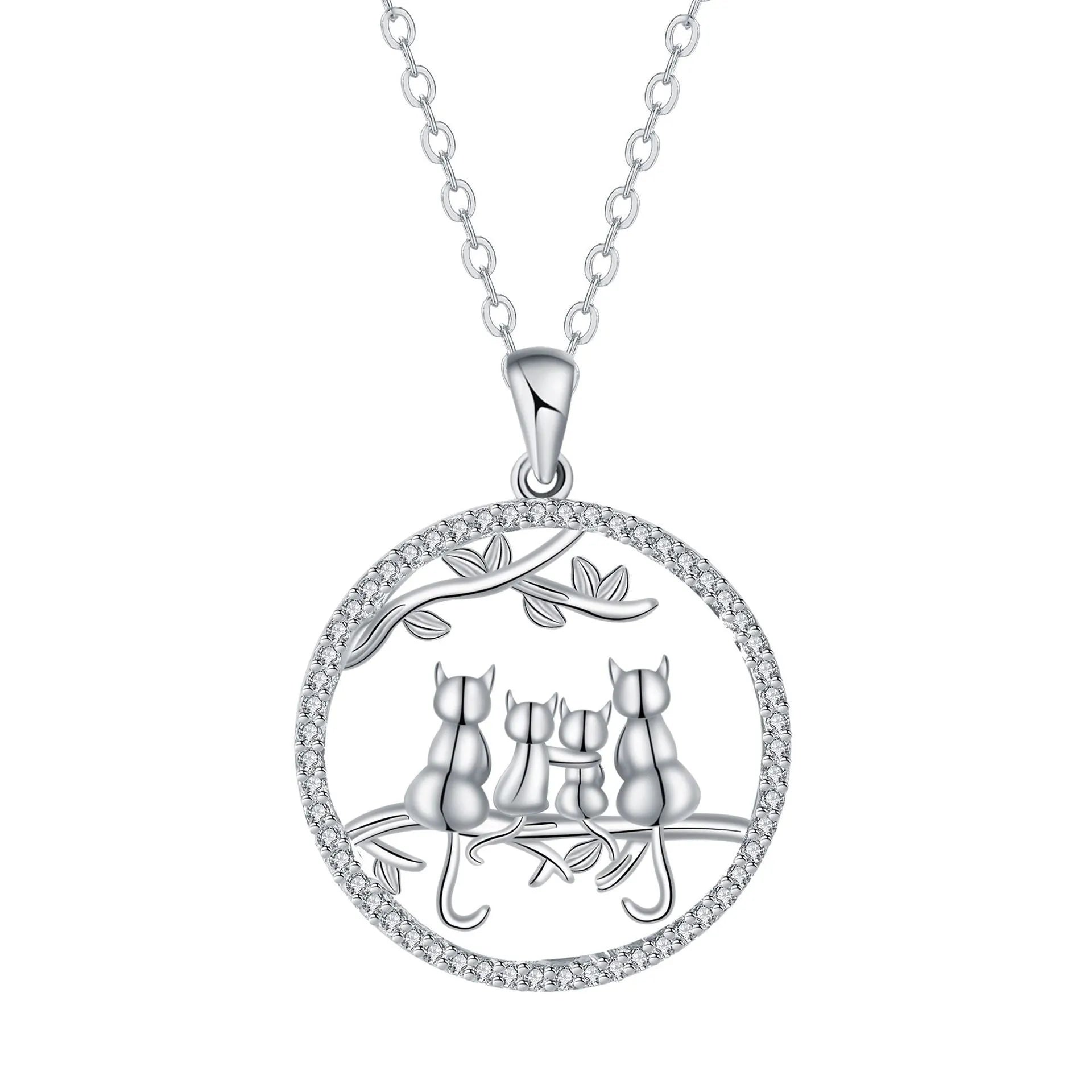 Four kitten pendant necklace on a copper cross chain with electroplated finish.