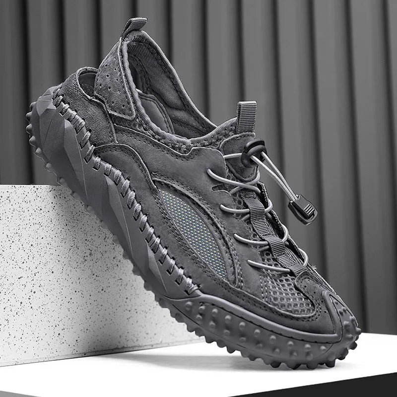 Men's black waterproof casual sports sandals with a leather mesh upper, elastic band, and rubber sole.