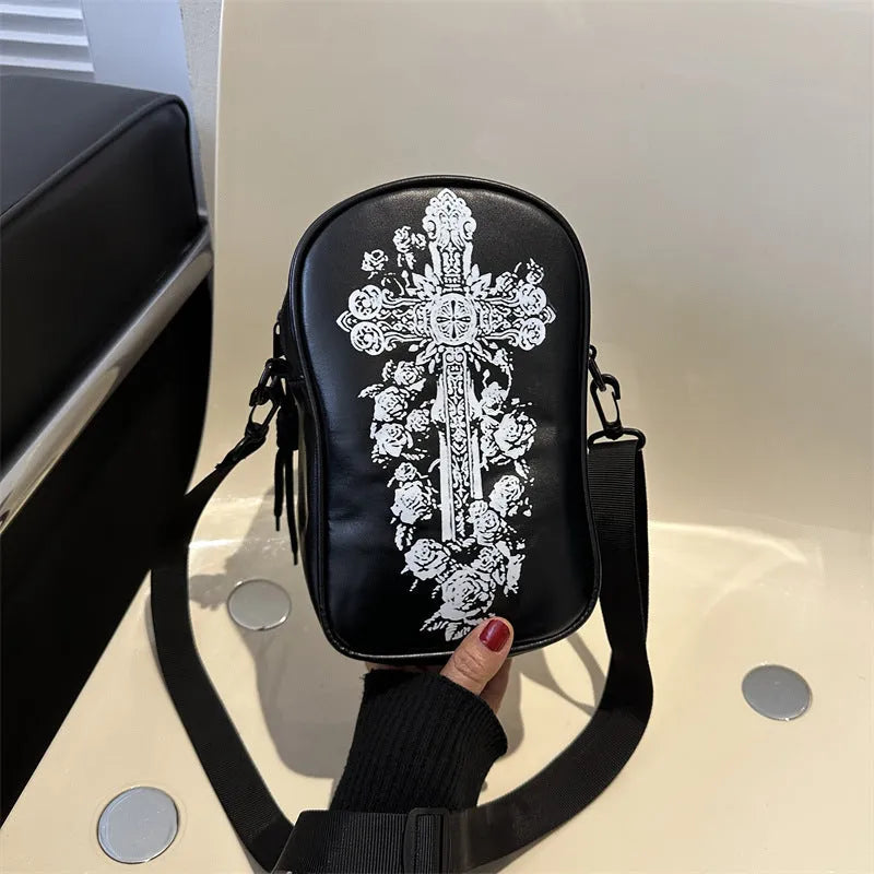Halloween graffiti print crossbody bag with cartoon pumpkin ghost bat design in orange colour