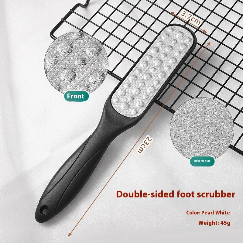 Double-sided stainless steel foot grinder with black and white abrasive pads for foot care