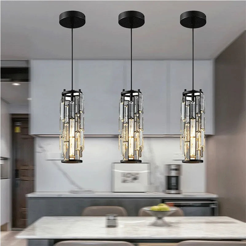 Industrial style crystal LED single head droplight pendant light in black, chrome, or gold finish.