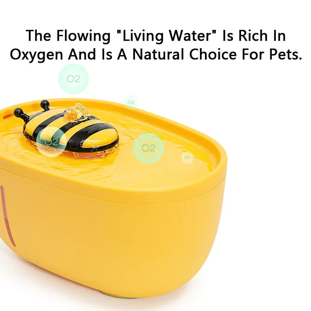 Yellow automatic cat water fountain with filtration system, water level window, and USB cable