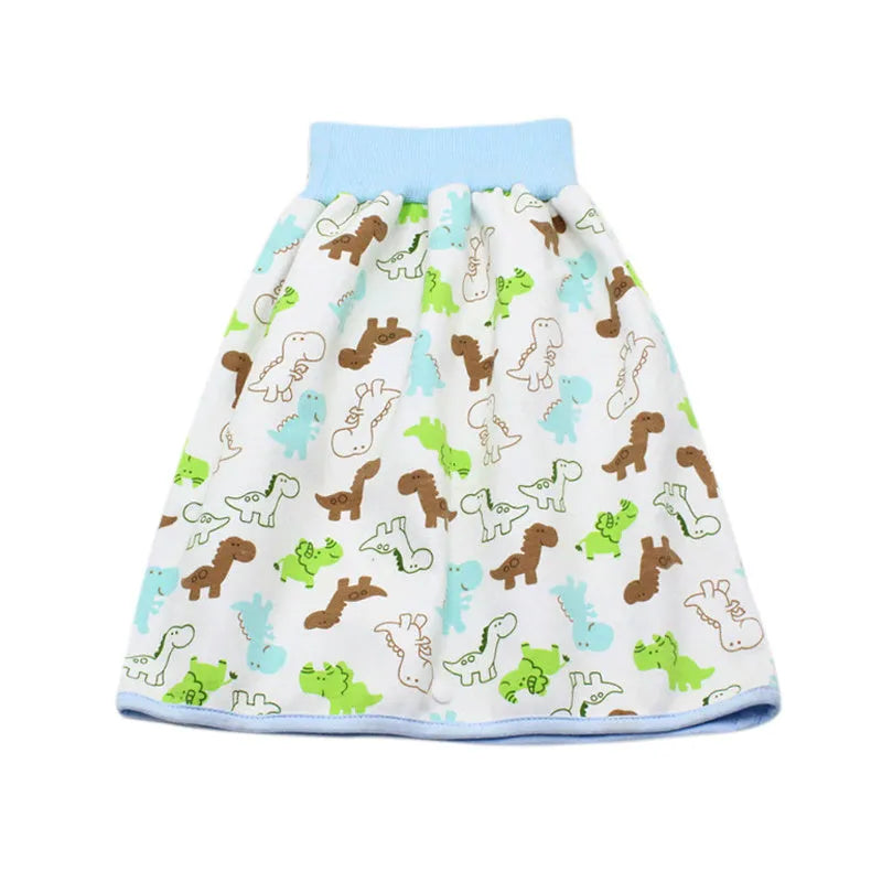 Baby girl wearing a multi-colour waterproof cotton diaper skirt with elastic waistband for belly protection