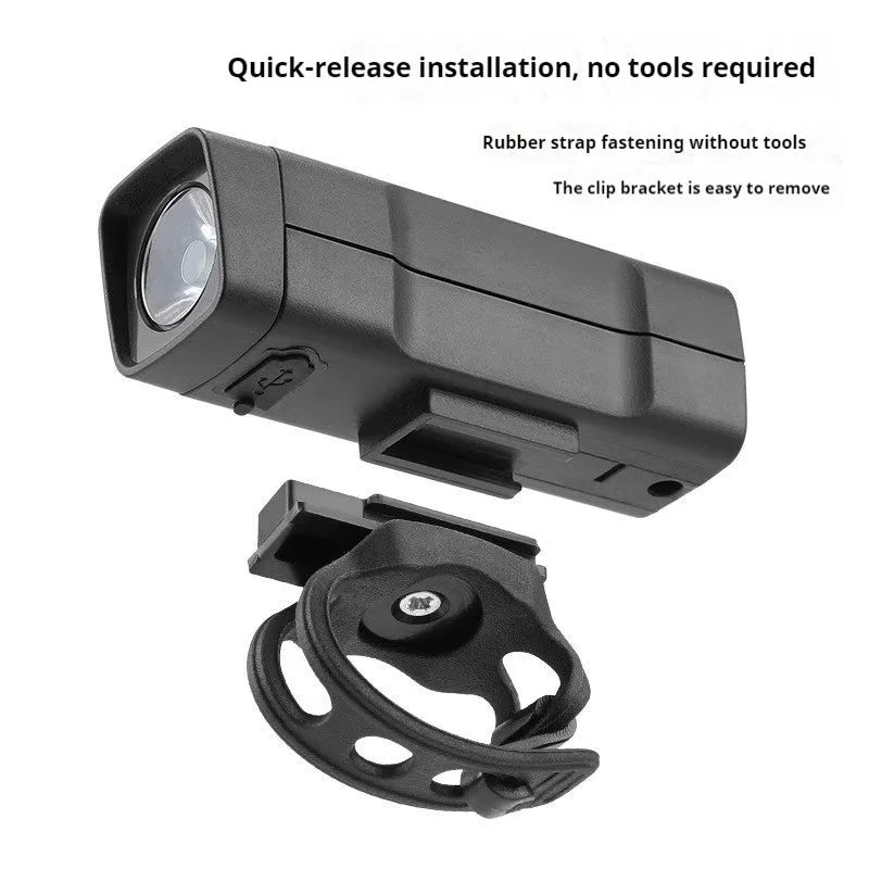 USB rechargeable bicycle headlight with quick release strap bracket mounted on handlebars
