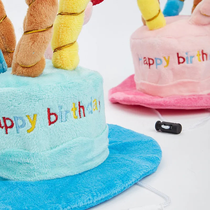 Blue and pink dog birthday hat toy with party whistle, measuring 21cm by 15cm by 6.5cm