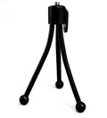Small aluminium folding tripod with ball head mounted with smartphone on desktop