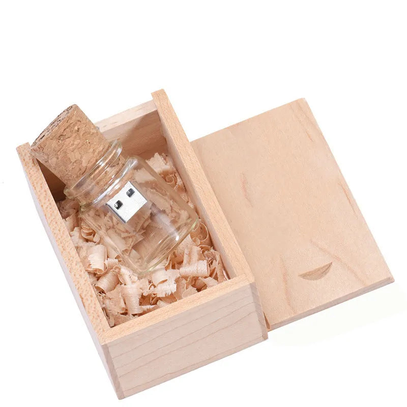 Chocolate brown wooden personalised USB memory stick shaped like a drift bottle, showing custom text engraving.