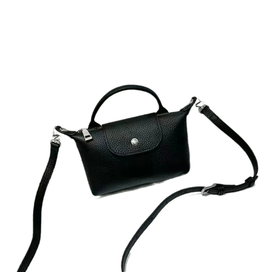 Top grain leather crossbody phone bag in dumpling shape with splicing detail available in black