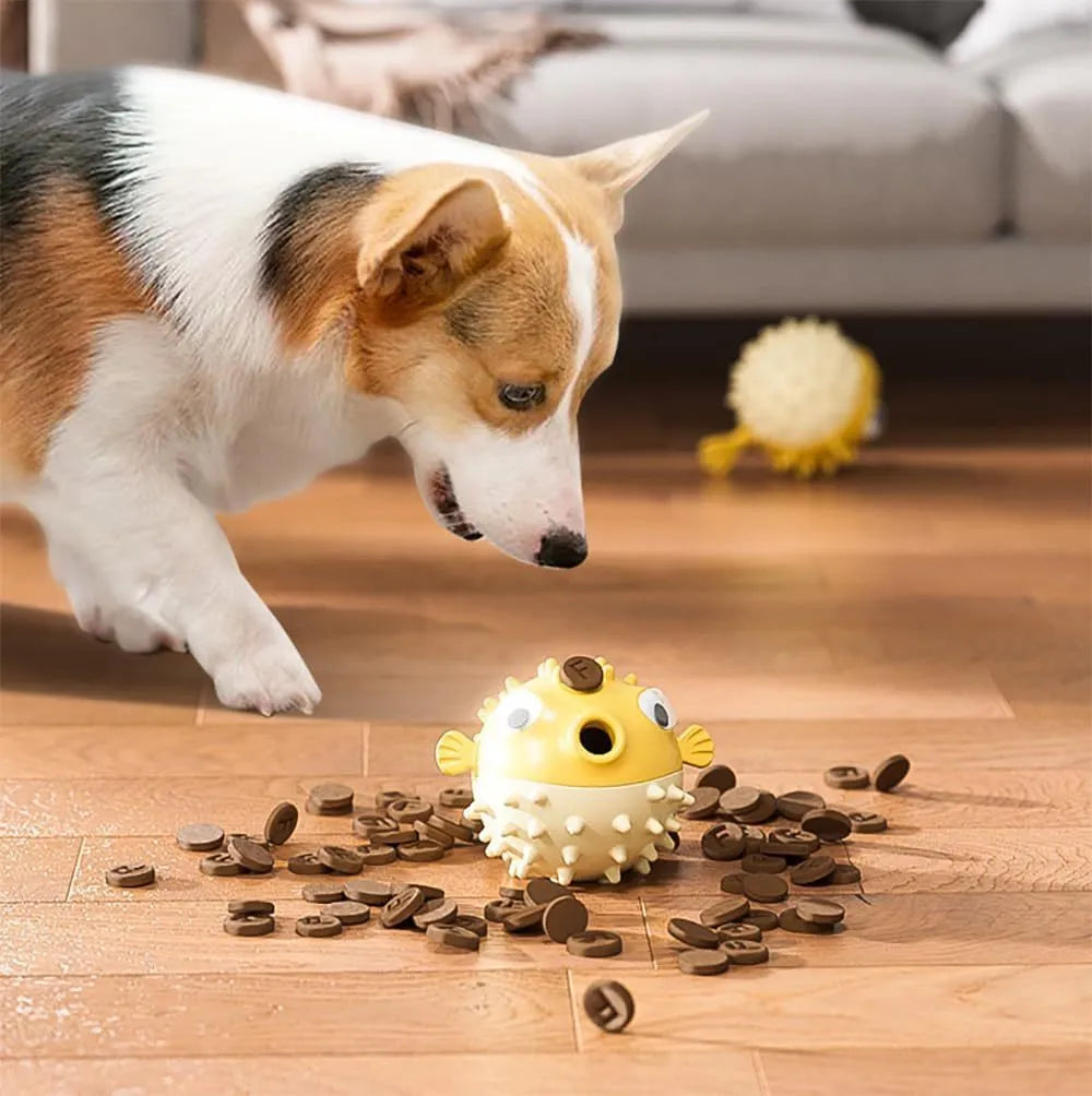 Green fish-shaped interactive dog toy with textured surface for medium and large dogs