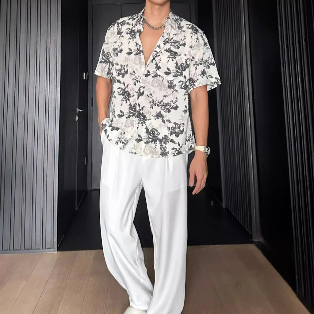 Black and white floral printed short sleeve shirt with loose fit cardigan style