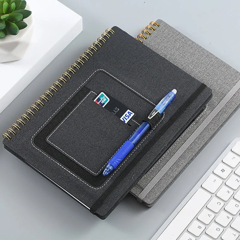 Erasable coil notebook with customisable cover options including black, blue, and wood grain designs.