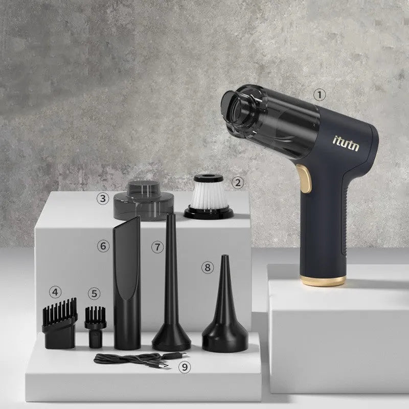 Black wireless handheld car vacuum cleaner with multiple nozzle attachments and USB charging cable
