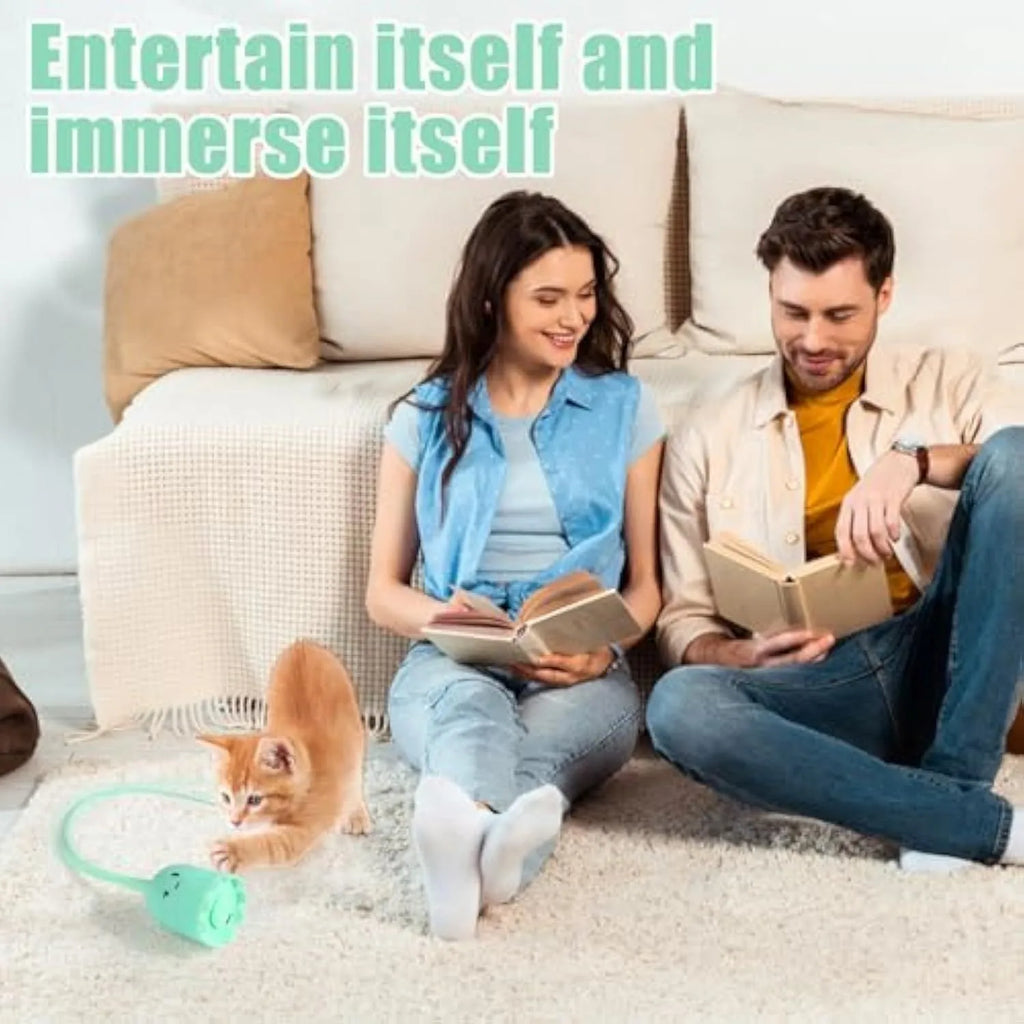 Green automatic cat wand toy with motorised silicone tails swinging, for indoor cat play.