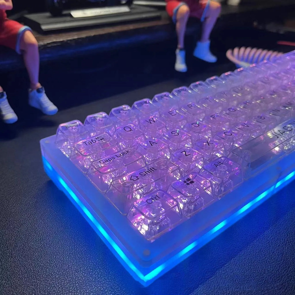 Transparent 132-key mechanical keyboard key cap set showing clear plastic construction