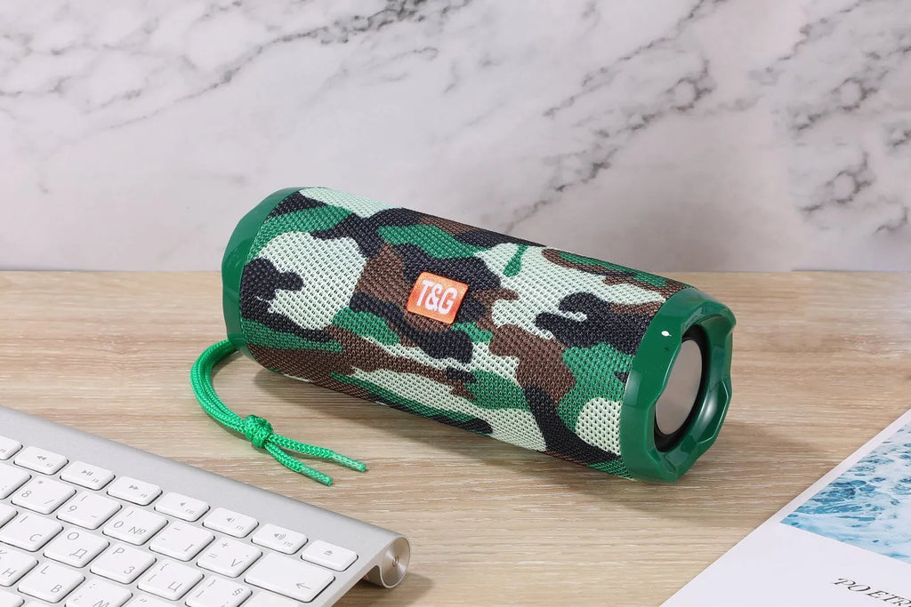 Fabric-covered portable Bluetooth speaker with a card slot in multiple colour options.