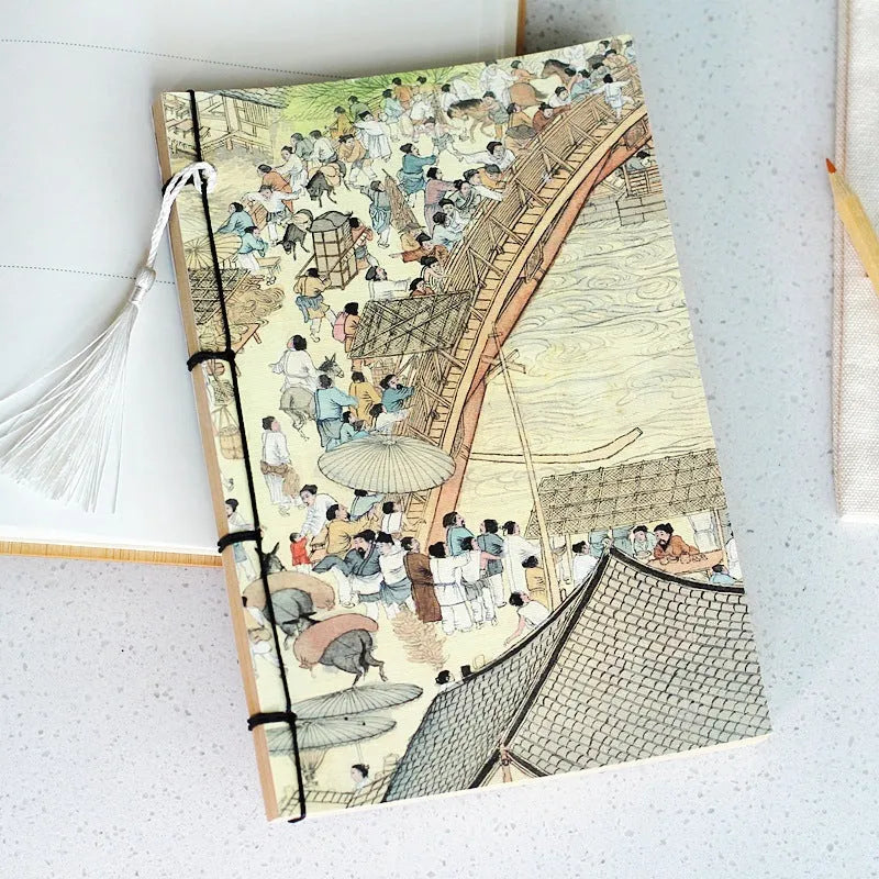 A5 antique thread-bound notebook with embossed cover and decorative tassels