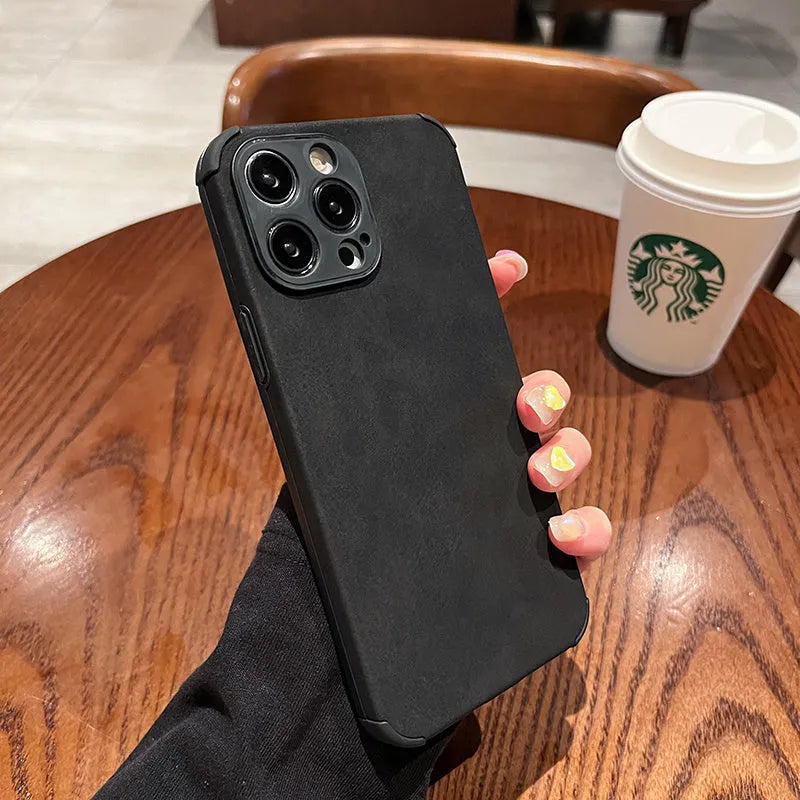 Simple solid colour fur phone case with imitation leather texture for iPhone fall prevention, available in black, blue, and green
