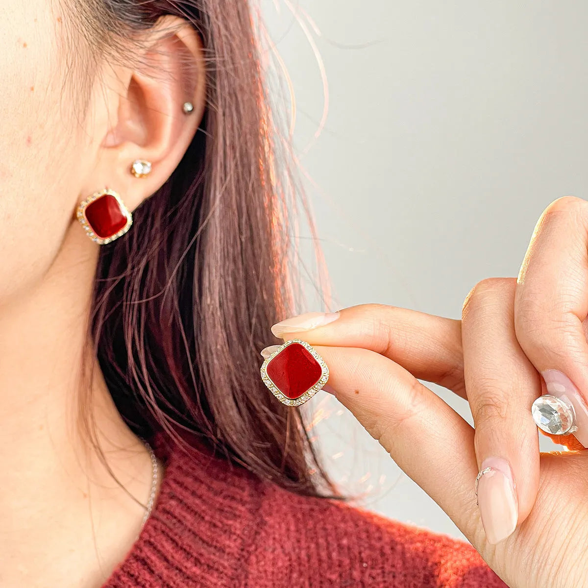 Red square plate earrings with geometric alloy construction and retro styling