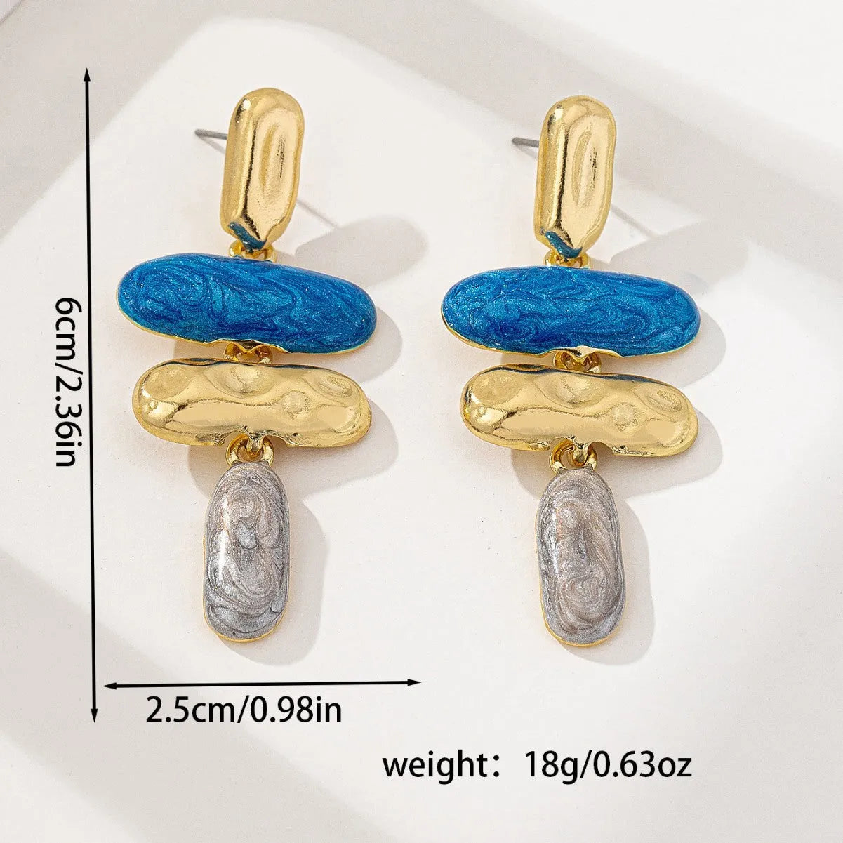 Geometry shaped stud earrings with multicolour electroplated finish on zinc alloy