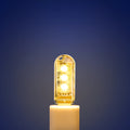 Compact USB-powered LED baby night light showing warm and white light colour options.