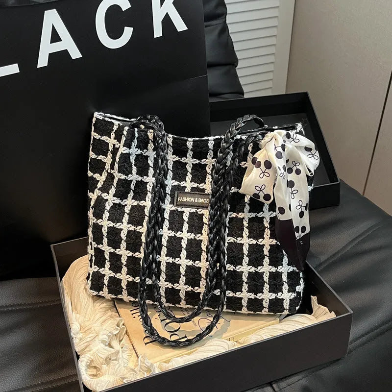Black wool blend horizontal square shoulder bag with internal compartments for commuting and shopping