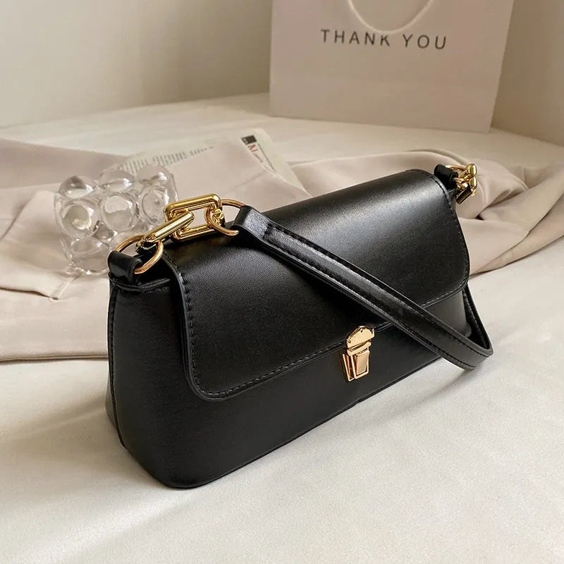 Brown PU leather underarm shoulder bag with square shape, sandwich pocket front and adjustable shoulder chain