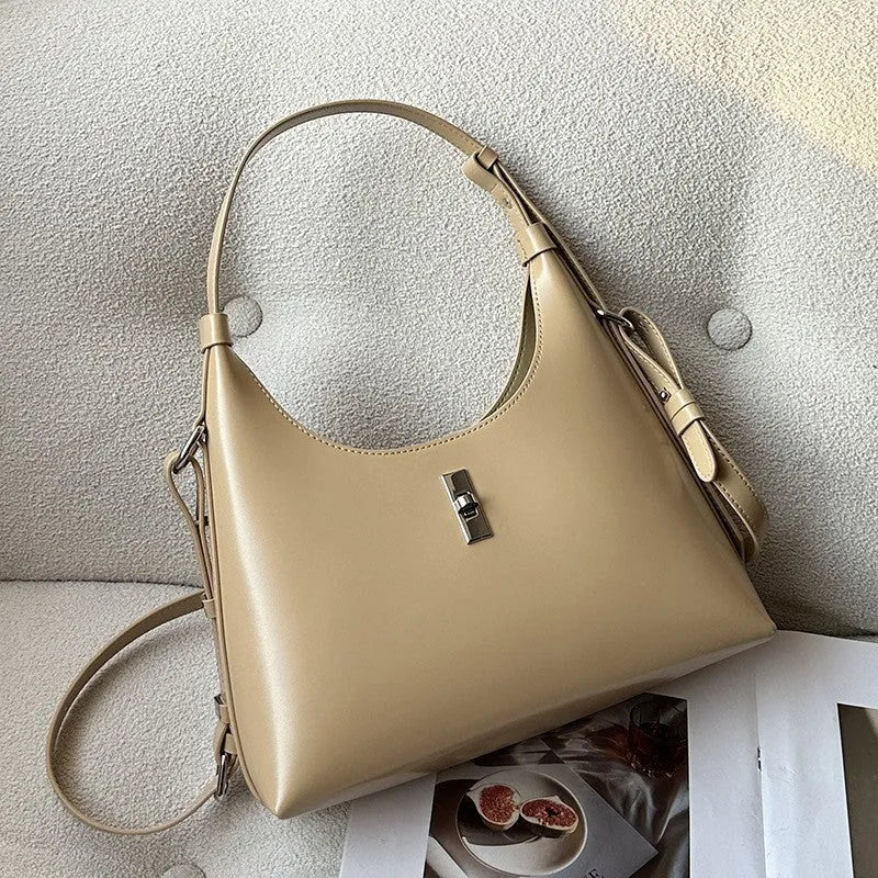 Genuine leather crossbody shoulder bag in dumpling shape with sandwich pocket design