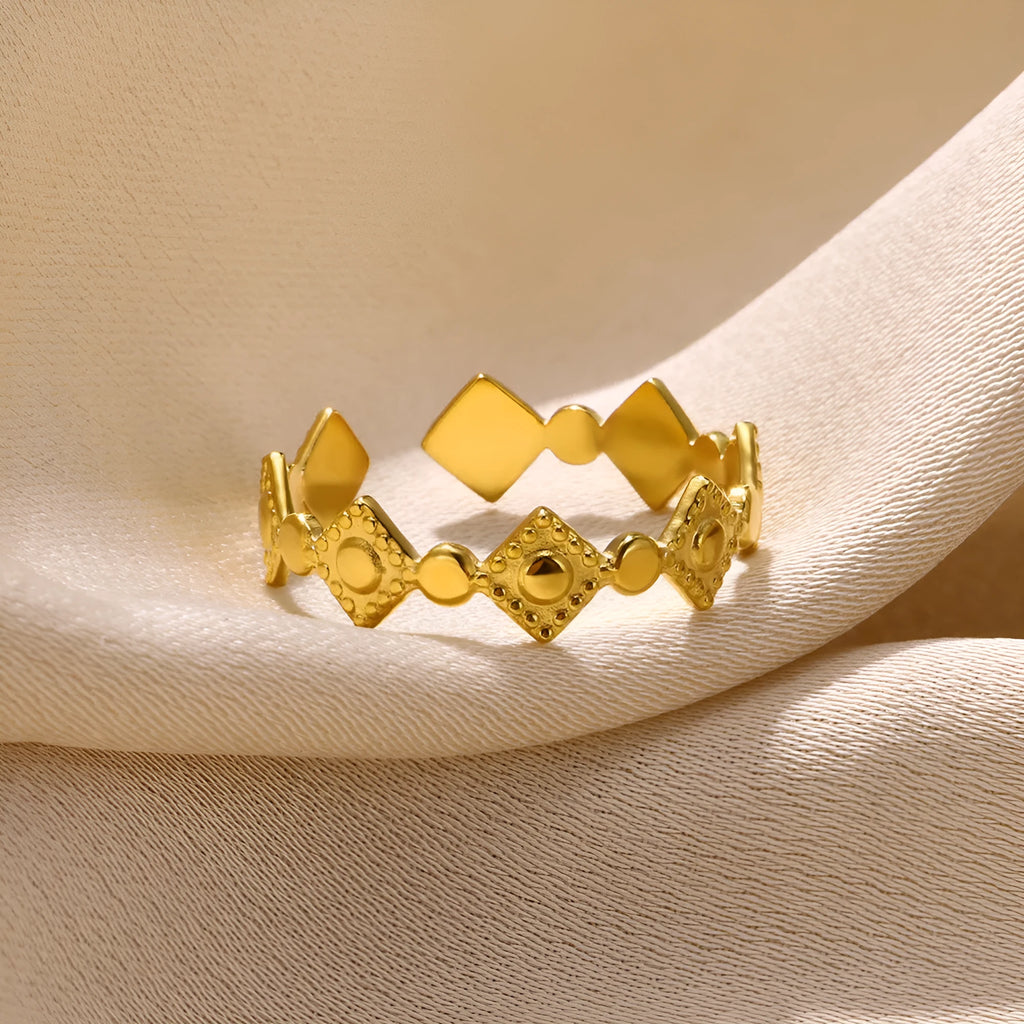 Geometric titanium steel women's ring with gold diamond finish