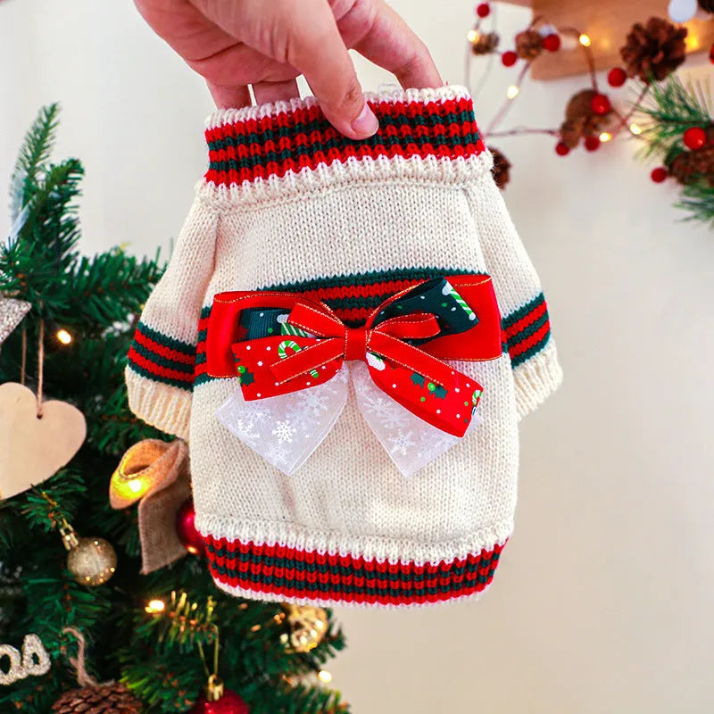 Red and green knitted polyester Christmas sweater for dogs and cats on a white background.