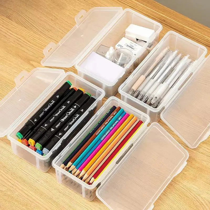 Clear plastic pencil storage box with large capacity for organising stationery and children's art supplies.