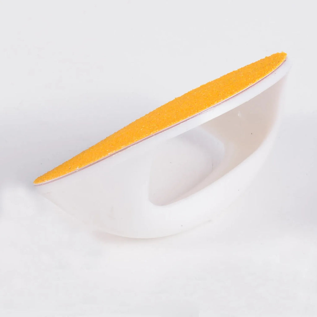 Dog nail file board with coloured handle and sandpaper surface for pet grooming