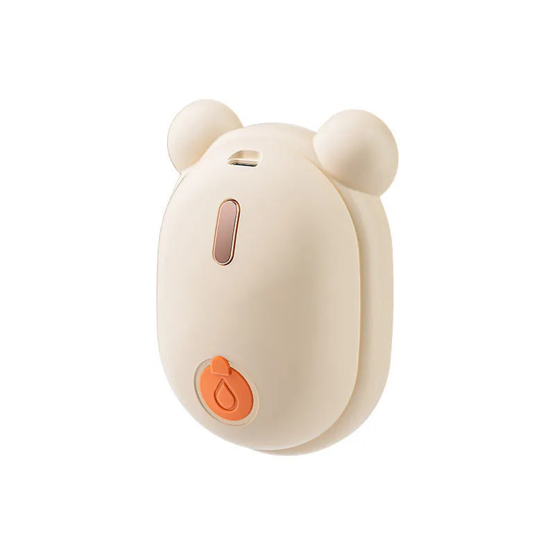 Pink rechargeable pet grooming brush with steam spray function and removable silicone comb teeth.