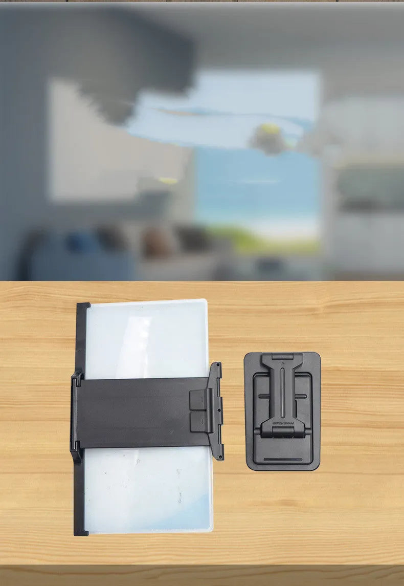 Black folding mobile phone screen amplifier with detachable holder showing 12 inch curved display
