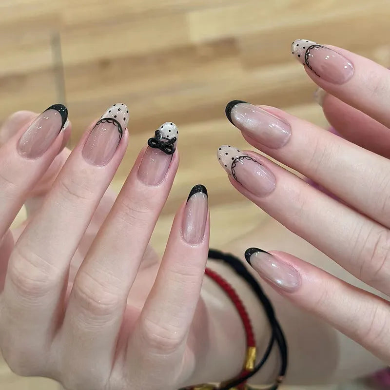 Press-on false nail kits showing multiple sets with assorted colours and adhesive tabs